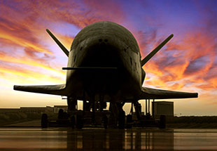 Front picture of the X 37 B Space plane on tarmac. X-37B